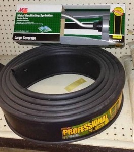 lot 278 image: Professional Lawn Edging and Sprinkler.