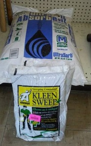 lot 294 image: Kleen Sweep (2) and Absorbant.