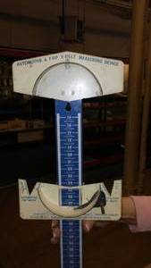 lot 308 image: Vintage Metal Automotive Belt Measuring Gauge.