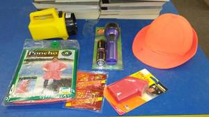lot 220 image: All Weather Poncho, Flashlights, Hand warmers and More.