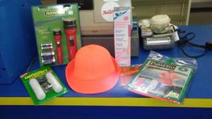 lot 222 image: All Weather Poncho, Flashlights, Hand warmers and More.