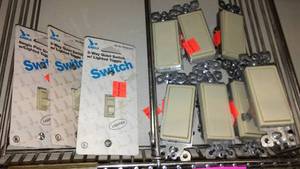 lot 385 image: Lighted (3) and Paddle switches (7), Beige.