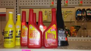 lot 440 image: Gas Line Antifreeze (2) Water Remover (5), Funnel.