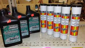 lot 475 image: Marine Bearing Grease (5) and Engine Oil (3).