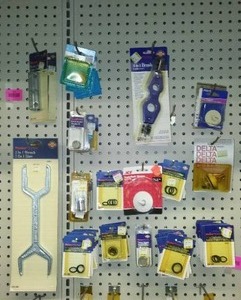 lot 493 image: Misc. Plumbing, Screens, Brush, Stoppers and More.