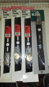 lot 726 image: Assorted Lawnmower replacement Blades. (4) 18 in.