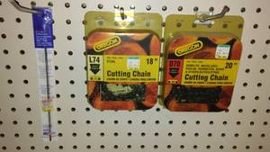 lot 734 image: Oregon Chain Saw Blades (2) and Chainsaw File.