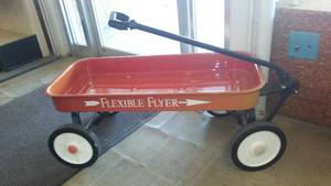 lot 690 image: Flexible Flyer Red Wagon.