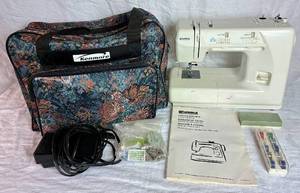 lot 128 image: Kenmore Sewing Machine and Travel Bag- Model  385.15512000