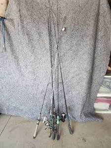 lot 55 image: Lot of Fishing Poles Open and Closed Face in Good useable Condition