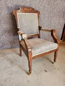 lot 64 image: Cool ornate antique Chair with front side wheels and great detail
