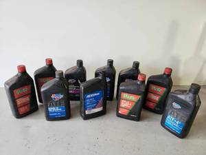 lot 73 image: Lot of Various Almost All Full unused Tranfer Case, Trasmission Fluid