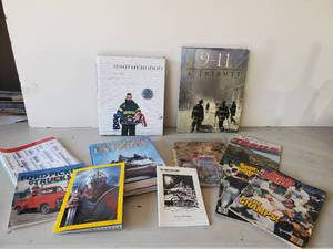 lot 90 image: Coffee Table Lot of Books and Magazines 911 Tribute, 2002 Checker autoparts 500 Magazine and more