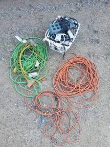 lot 93 image: Extension Cords and A Basket of power strips with Basket