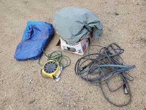 lot 189 image: Garden Hose Power Cord Tarp and Suv Gulf Stream Car Cover