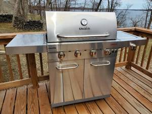 lot 218 image: Charbroil Grill with Propane Tank and cover   Grill works as it should and is in Good Condition