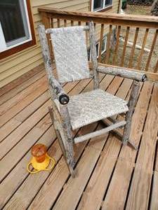 lot 220 image: Handmade Rocking Chair made of Wood Logs and bird Feeder