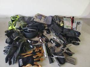 lot 238 image: Gloves, Maglite Flashlight, Gerber Folding pliers, Ford emblem, Sunglasses and So Much More