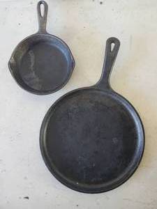 lot 246 image: Size 8 and Size 4 Cast Iron Pans one marked Lodge on the Bottom,  both in good condition