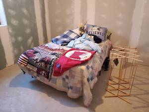 lot 280 image: Nice Bed For when Company Comes, Smart base Dual metal Beds with 4 in 1 Adventuridge Airbeds along with a Gorgeous Firefighters Blanket and MN Twins Throw and More  NOTICE Buyer is responsible for Loading and Removal 