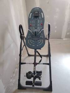 lot 282 image: Hang Ups Teeter Designed for Back Pain Relief and Spinal Decompression NOTICE Buyer is responsible for Loading and Removal 