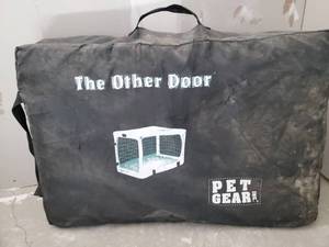 lot 286 image: Folding Pet Gear Kennel with Case in good condition Refer to Lot 285 for reference NOTICE Buyer is responsible for Loading and Removal 