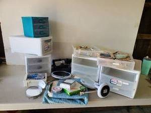 lot 294 image: Mixed Bathroom Lot Wahl Beard Trimmer like new, Makeup Magnifying Mirrors, Heating Pad, First Aid stuff and More