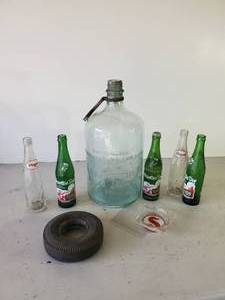 lot 304 image: Large Silent Glow Oil Burner Jug, Firestone Ashtray, Vintage Soda Bottles, and more