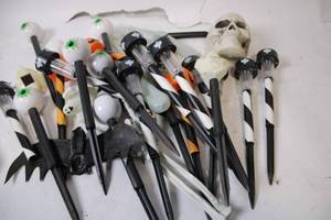 lot 27 image: Lot of Halloween-Themed Lawn Stakes with Skulls and Eyes