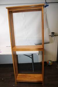lot 30 image: Tall Wooden Bookshelf with Open Slat Design