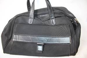 lot 46 image: Husky Golf Black Travel Duffel Bag with Multiple Compartments