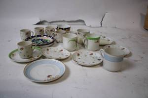 lot 61 image: Vintage Set of Floral Pattern Teacups and Matching Saucers