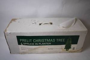 lot 78 image: Prelit 4 Spruce Christmas Tree with Planter