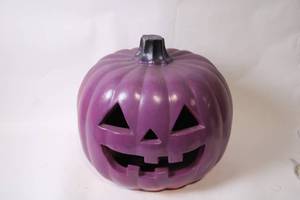 lot 89 image: Large Purple Pumpkin Decoration with Happy Face Design