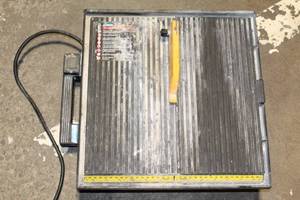 lot 214 image: Used Portable Wet Tile Saw with Stand