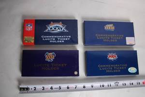 lot 232 image: Set of 4 NFL Super Bowl Commemorative Lucite Ticket Holders