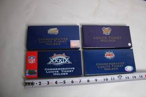 lot 237 image: Set of 4 Commemorative Lucite Ticket Holders for Super Bowl XXXII and XXXIX