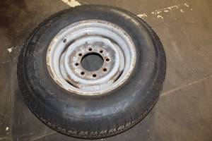lot 377 image: Goodyear Wrangler P24575R16 Tire with Rim