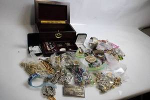 lot 378 image: Large Lot of Assorted Jewelry and Winchester Collectible Belt Buckle