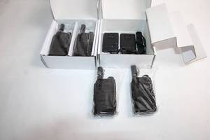 lot 438 image: Set of 4 Two-Way Radio Walkie Talkies with Accessories