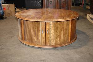lot 448 image: Round Wooden Coffee Table with Sliding Doors