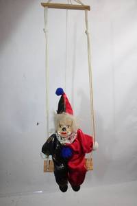 lot 459 image: Vintage Clown Doll on Swing