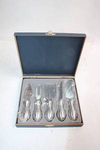 lot 476 image: Treasure Island Resort Stainless Steel Cheese Knife Set in Box