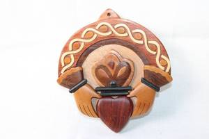 lot 222 image: Islandcraft Celtic Carvings Wood Decorative Piece