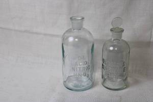 lot A-249 image: Set of 2 Vintage Glass Lab Bottles with Embossed Labels
