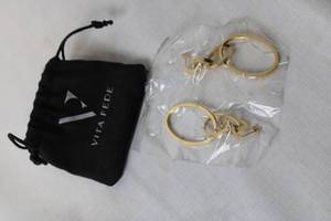 lot 253 image: Vita Fede Gold-Tone Hoop Earrings with Black Drawstring Pouch