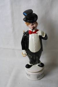 lot 279 image: Antique Music Box Bottle Stopper Figurine with Top Hat