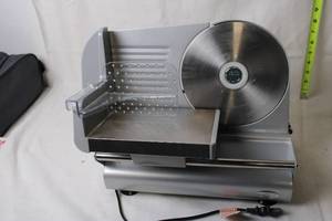 lot A-291 image: Commercial Meat Slicer with Adjustable Thickness Control
