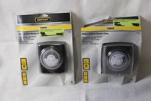 lot 324 image: Set of 2 Defiant 15 Amp Plug-In Extreme Weather Outdoor Mechanical Timers