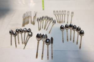 lot 369 image: Stainless Steel Flatware Set with Gold and Silver Accents - 48 Pieces